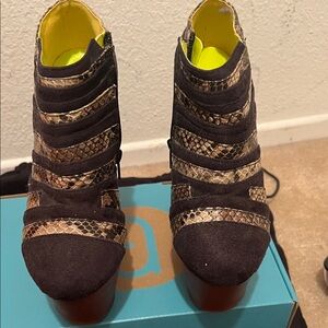 Elegant Black and Brown Heeled Boots